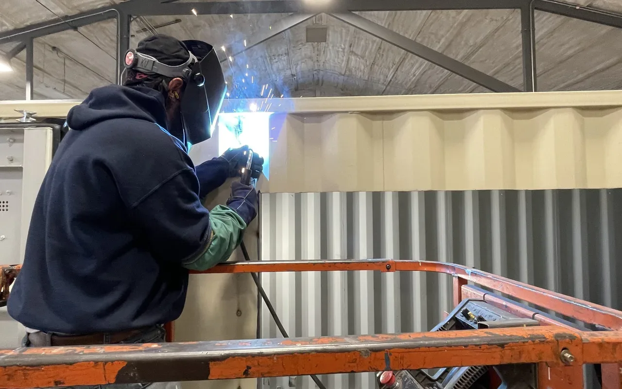 Custom container with roll-up door modification